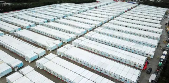 沖鋒一線顯擔當！山河智能挖掘機助力長沙方艙醫(yī)院建設